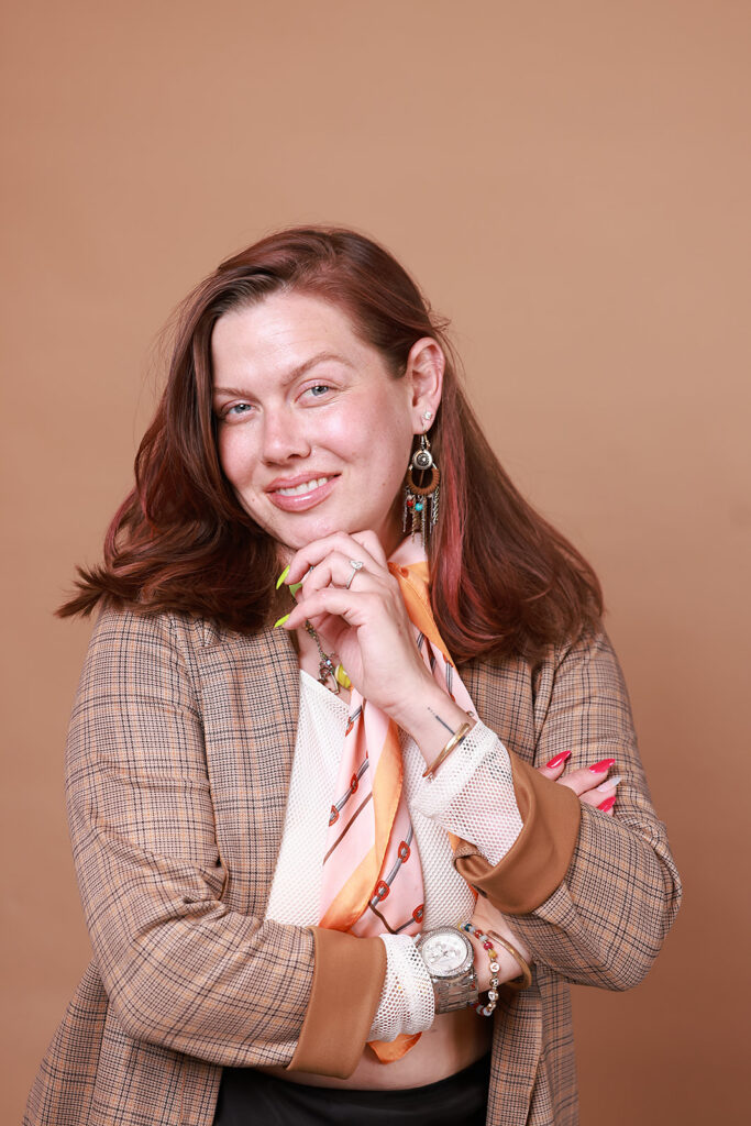 headshot of a women on a mocha backdrop