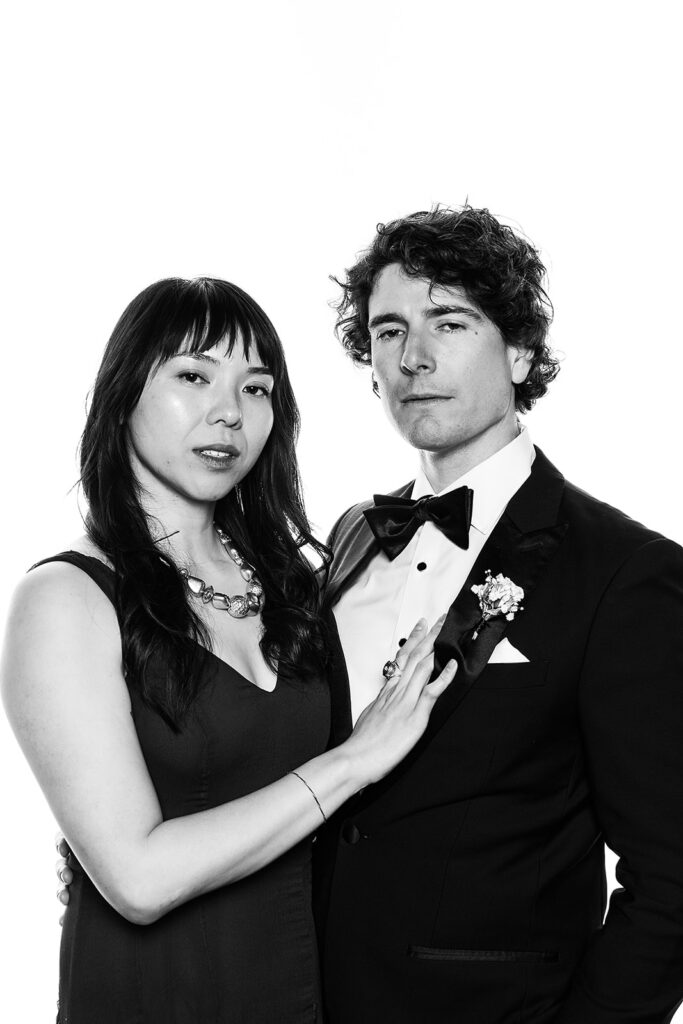 couple looking at the camera black and white

