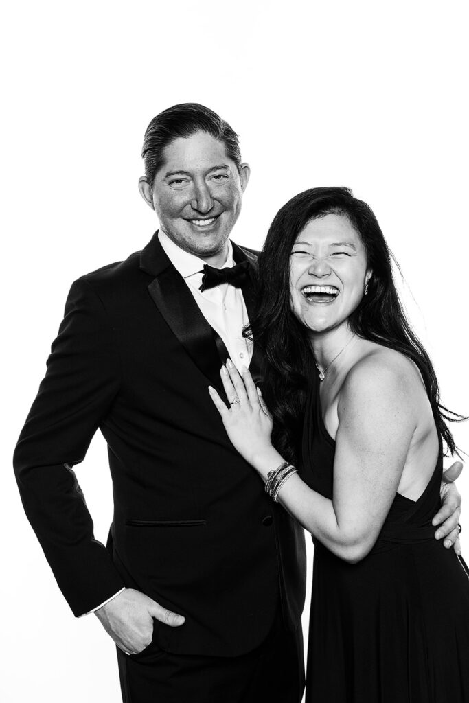 couple laughing in the glam booth