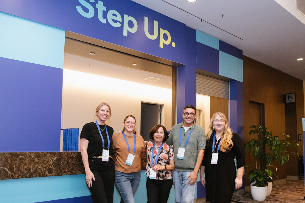 attendees in front og check in desk at Visa NAMK26