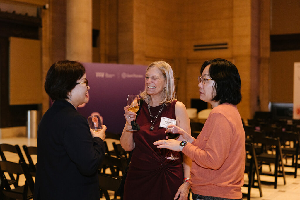3 women talking and smiling