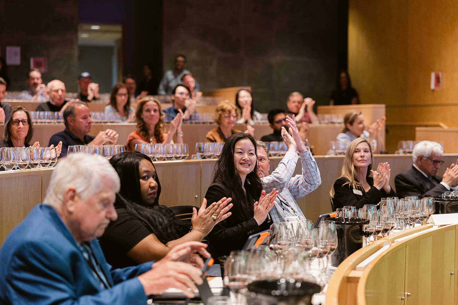 Audience applauding at the Vine to Mind Symposium, captured by Lumina Studio's Harvard Data Science photographer.